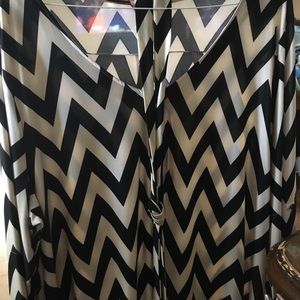 Dress with chevron design and sash